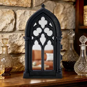 Black gothic arch window mirror detail, vintage tabletop decor ornament for home.