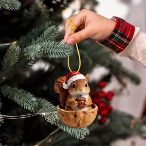 Christmas squirrel in walnut shell ornament detail view, festive tree hanging decoration.
