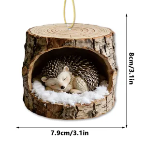Cute sleeping hedgehog acrylic hanging ornament with winter snow tree stump design for home decor.