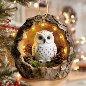 Christmas owl tree hollow hanging ornament with warm string lights and pinecones decor.