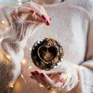 Cute squirrel tree hole Christmas tree hanging pendant detail, winter holiday decor ornament display