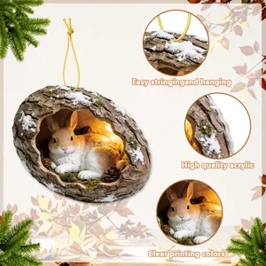 Detail shot of cute rabbit tree hole hanging acrylic ornament with warm light and pinecones.