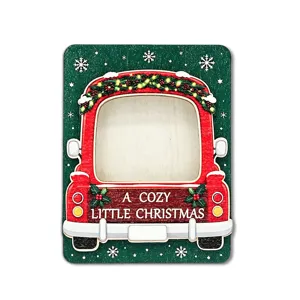 Close-up detail view of wooden Christmas red truck magnetic photo frame design and festive decor.