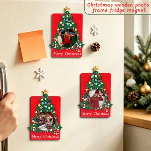 Close-up of wooden Christmas photo frame magnets on fridge with festive seasonal decor.