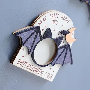 Halloween wooden magnetic photo frame detail view, bat design holiday decoration magnet.