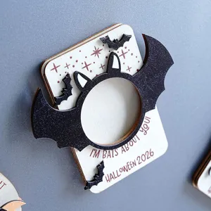 Wooden Halloween magnetic photo frame detail showing layered bat and star cutout design.