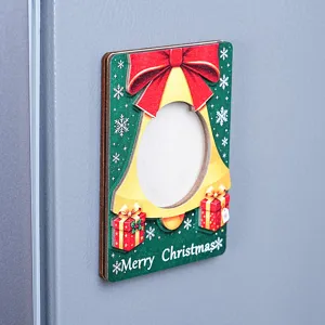 Detailed view of wooden 3D Christmas magnetic photo frame fridge magnet with bow and bell.