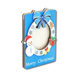 Wooden Christmas magnetic photo frame detail view, 3D holiday fridge sticker with cute snowman.