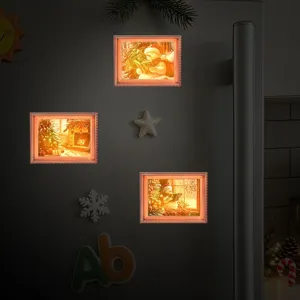 Gedetailleerd overzicht van kerst verlichte fotolijst koelkastmagneet, houten decoratie.