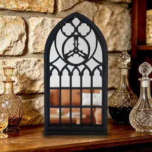 Gothic arched window wall mirror detail, vintage black frame decor for home tabletop styling.