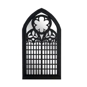 Gothic window mirror detail view, black arched frame decor, wall hanging ornament close up