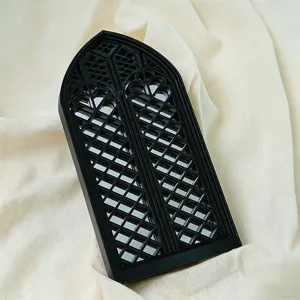 Gothic arched window mirror detail shot, black decorative wall mirror frame for home decor.