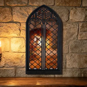 Gothic window wall mirror detail, black arched frame with vintage grid design for home decor.