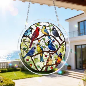 Detailed view of colorful acrylic bird suncatcher hanging pendant for bright window decor.