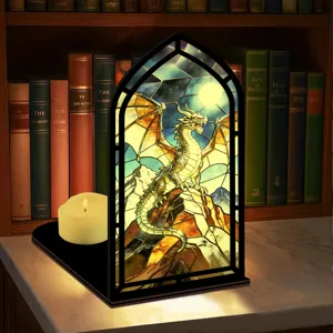 Vista dettagliata del fermalibri drago gotico con luce calda e decorazione per libreria.
