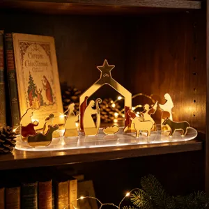 Décoration de table de scène de nativité de Noël en acrylique miroir doré pour affichage festif.