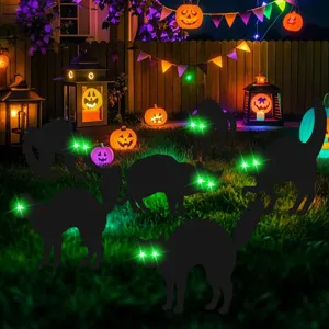 Halloween black cat yard stakes with glowing green eyes for outdoor lawn garden holiday decor detail