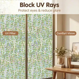 Detailed view of static window privacy film with green leaf pattern and UV blocking design.