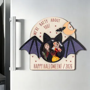 Halloween wooden magnetic photo frame detail view, creative bat wings holiday decor.