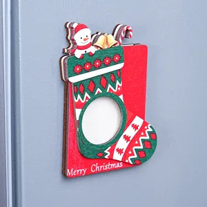 Wooden Christmas magnetic photo frame fridge magnet detail shot showing festive 3D design.