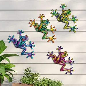 Colorful metal frog wall hanging detail, outdoor garden decor scene displaying vibrant painted art.