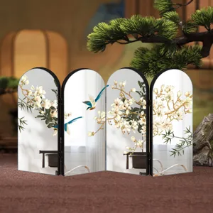 Exquisite desktop folding screen detail with Chinese floral mirror design, elegant home decor.