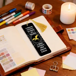 Creative metal acrylic bookmark with gold tassel and dragon quote design for reading lovers.