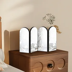 Decorative tabletop folding mirror screen with artistic bird pattern for home decor.
