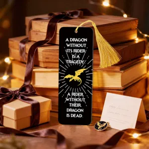 Creative black and gold dragon metal bookmark with elegant tassel for book lovers reading.
