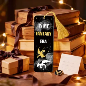 Acrylic fantasy bookmark featuring gold tassel and dragon graphics for book lovers.