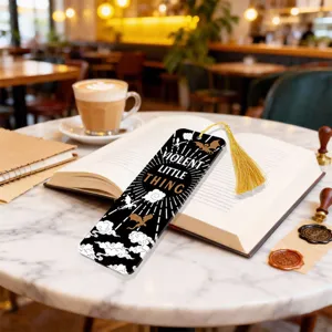 Acrylic bookmark with golden tassel, stylish reading accessory and decorative book marker.