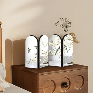 Chinese style desktop folding screen ornament with elegant floral and bird design details.