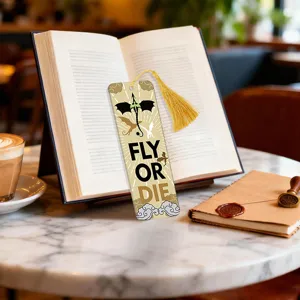 Translucent acrylic bookmark with gold tassel, featuring dragon design and inspirational text style.
