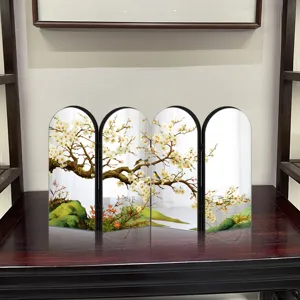 Detail view of a creative Chinese-style acrylic folding mirror screen ornament with plum blossom art.