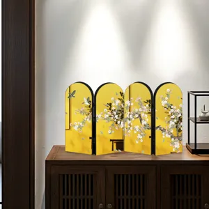 Chinese style folding screen detail, yellow mirror backdrop with plum art decor.