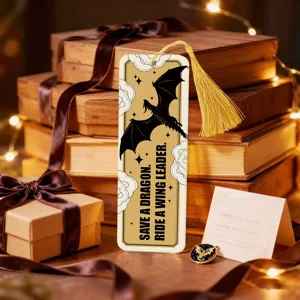 Acrylic bookmark with gold tassel, fantasy dragon design and quote, perfect reading gift.