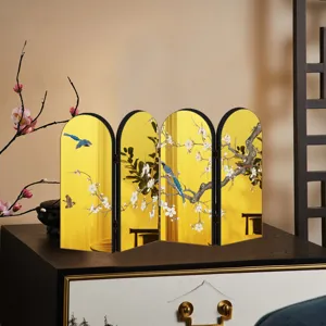 Detailed shot of Chinese style miniature folding screen tabletop decor with gold mirror panels.