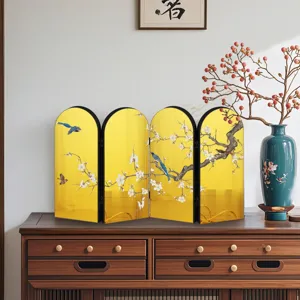 Close-up detail of the traditional Chinese desktop folding screen ornament with golden finish.