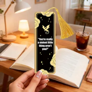 Metal or acrylic bookmark with gold tassel, dragon pattern and motivational quotes.