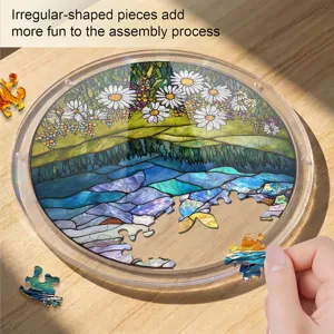 Round acrylic jigsaw puzzle with stained glass floral design and irregular pieces.