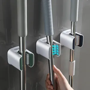 Stanzfreier Wandmontierter Mop Halter Besen Clip Aufbewahrungsregal Kunststoff Roller Organizer Für Badezimmer Und Küche