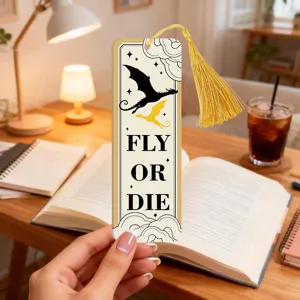 Acrylic dragon bookmark with golden tassel, cool fantasy reading accessory and gift.