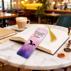 Translucent acrylic bookmark with gold tassel, colorful gradient design for book lovers.