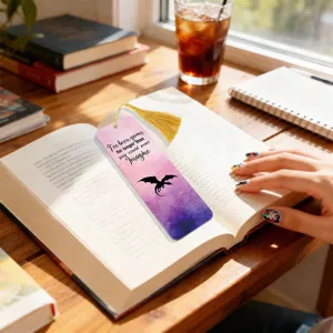 Creative translucent acrylic bookmark with golden tassel and gradient colorful design style.