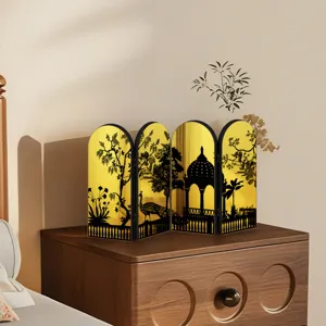 Miniature Chinese folding screen desktop ornament with gold mirror surface and black silhouette.
