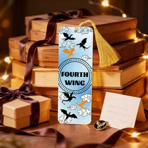 Translucent acrylic bookmark with dragon pattern and gold tassel for book lovers reading gift.