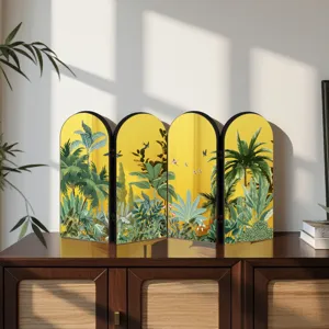 Mini golden mirror screen desktop ornament with tropical jungle pattern for home decoration.