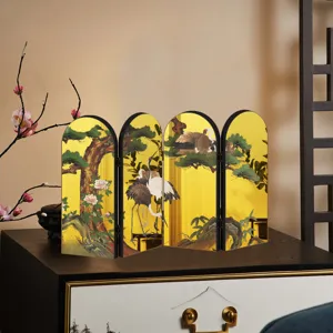 Traditional Chinese gold folding screen desktop decor with elegant crane and pine tree motifs for home.