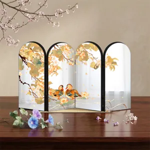 Detailed view of Chinese style mirror folding screen, elegant lotus and mandarin duck pattern.