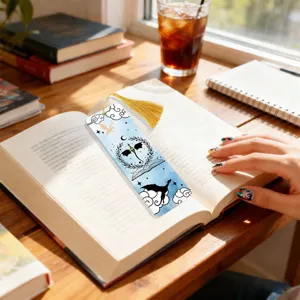 Creative translucent acrylic bookmark with golden tassel, fantasy dragon design for reading.